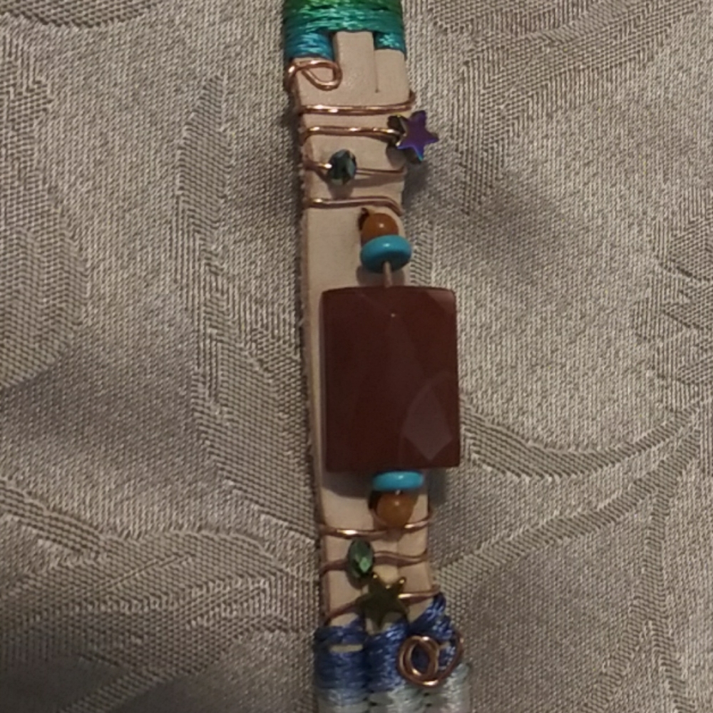 Handmade bracelet.  Clasp is 8" for the wrist size